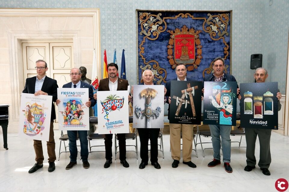 El alcalde Luis Barcala hace públicos los carteles anunciadores de las siete fiestas de Alicante en 2018-19