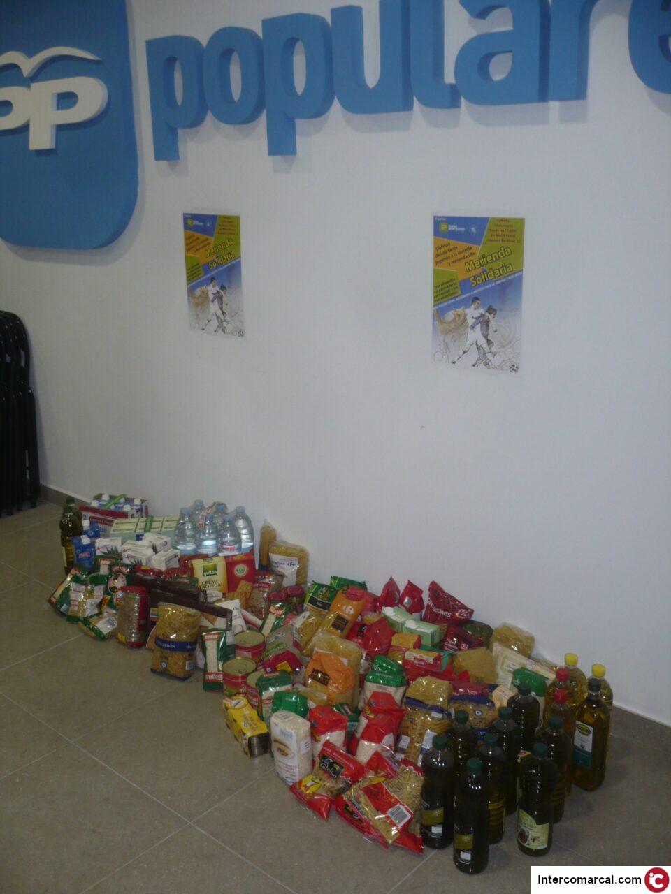 Nuevas Generaciones del PP de Petrer recoge 200 kg de alimentos en la "merienda solidaria" a favor de Cáritas Interparroquial